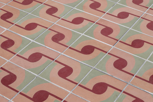 Pink and green patterned tile