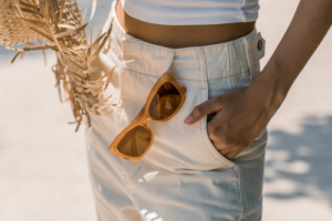 pants with sunglasses sticking out of them