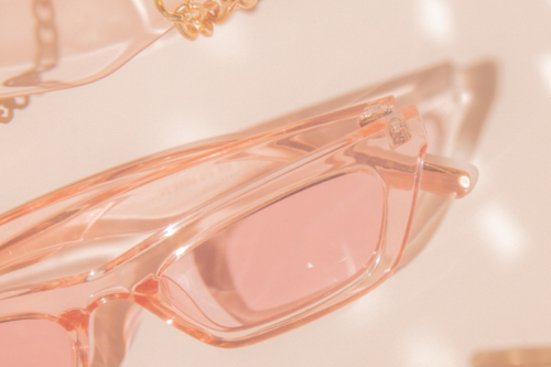 sunglasses on pink background